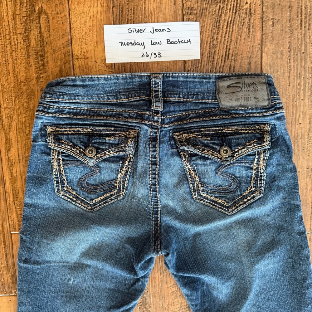 Silver Jeans Medium Blue Low Bootcut Jeans with Decorative Back Pockets